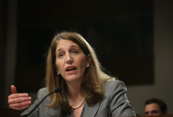 Secretary of Health and Human Services Sylvia Burwell at a Senate hearing in 2014. "We expect this to be a transition period for the marketplace," she told reporters Wednesday. "Issuers are adjusting their prices, bringing them in line with actual data on costs." Alex Wong/Getty Images