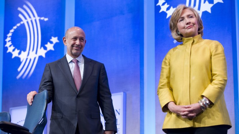 Goldman Sachs Chairman & CEO Lloyd Blankfein stands with Hillary Clinton during the 2014 Clinton Global Initiative meeting in New York on Sept. 24, 2014. Stephen Chernin/AFP/Getty Images