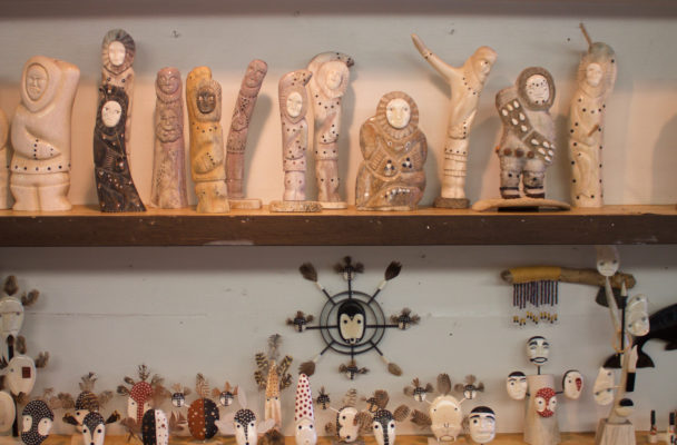 Walrus ivory carvings and masks, like these on display at Maruskiya’s in Nome, may be threatened by other states’ bans on the sale, purchase, and trade of various types of ivory. (Photo by Emily Russell/KNOM)