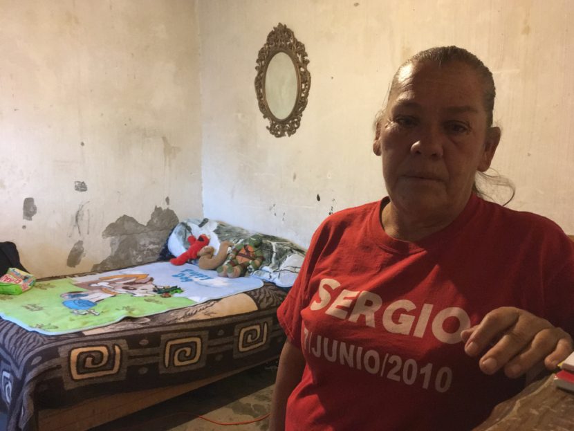 Maria Guadalupe Hernandez stands in the room of her son, Sergio, 15, who was killed in 2010 by a Border Patrol agent shooting from El Paso, Texas, across the river, into Juarez, Mexico. The agent believed the teenager was throwing rocks. Monica Ortiz-Uribe/Monica Ortiz-Uribe for NPR