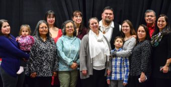 Alfie Price poses with his family and friends after he was honored as a language warrior during a Nov. 22, 2016, awards ceremony. (Photo courtesy Central Council of Tlingit and Haida Indian Tribes of Alaska)