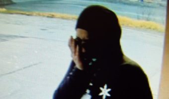 Surveillance video still of woman police believe planned to rob the Douglas Breeze In, Sunday.