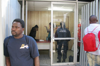 Haitian nationals at a Mexican government immigration office near the port of entry between Nogales, Sonora, Mexico, and Nogales, Ariz., wait day after day for appointments with U.S. immigration agents so they can enter. As a result of the Haitian influx and a continuing surge of Central Americans on the Texas-Mexico border, the U.S. government has run out of detention space. (Photo by John Burnett/NPR)
