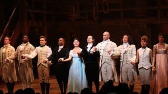 Leslie Odom Jr., Phillipa Soo and Ariana DeBose with Lin-Manuel Miranda with the cast during their final performance curtain call of "Hamilton" in July. Walter McBride/WireImage