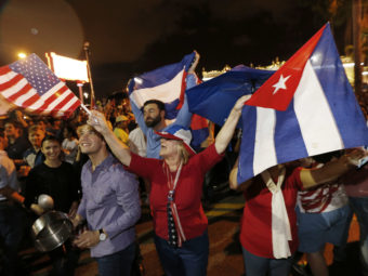 Cuban-Americans celebrate upon hearing about the death of longtime Cuban leader Fidel Castro in the Little Havana neighborhood of Miami, Fla., on Saturday. AFP/AFP/Getty Images