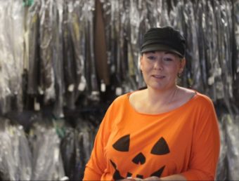 Starla Heim, the owner of Dooleys Tuxedos and Costumes. (Photo by Wesley Early, Alaska Public Media – Anchorage)