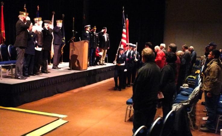 A Coast Guard color guard presents the colors during Friday's Veterans Day observance at Centennial Hall.