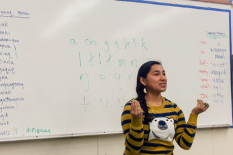 Marjorie Tahbone, the new vice chair of Inuusiq, Inc., teaching an Inupiaq class at the Nome high school in 2014. Inuusiq, a new non-profit, is creating a language nest in Shishmaref to revitalize Inupiaq culture and language. (File photo by KNOM)