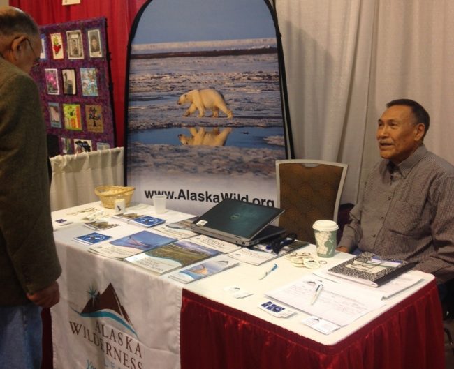 Ole Lake mans the Alaska Wilderness League table at the 2015 Alaska Federation of Natives convention.