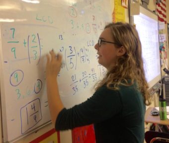 Madelene Reichard teaches seventh graders how to add and subtract unlike fractions at Bethel Regional High School. Reichard graduated from BRHS and a LKSD Board scholarship funded a portion of her college education.