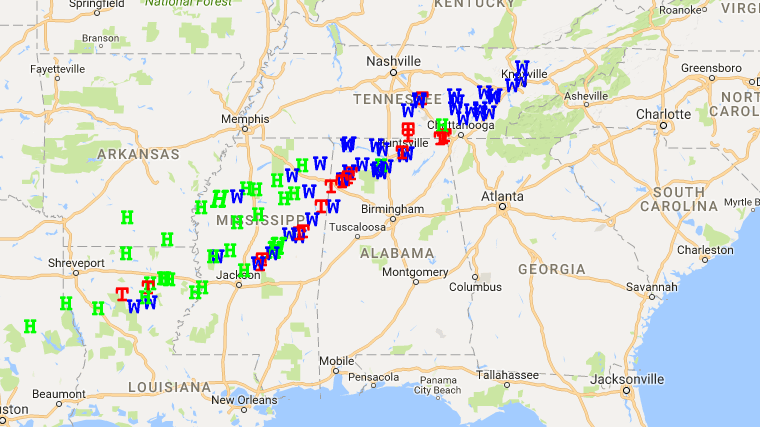 This map from the National Weather Service shows tornado reports (red T), wind reports (blue W) and hail reports (green H) for Tuesday. More than 20 tornadoes were reported as a powerful storm system moved through the Southeast. Zoom in on the map here. (National Weather Service/Google Maps/Screenshot by NPR)