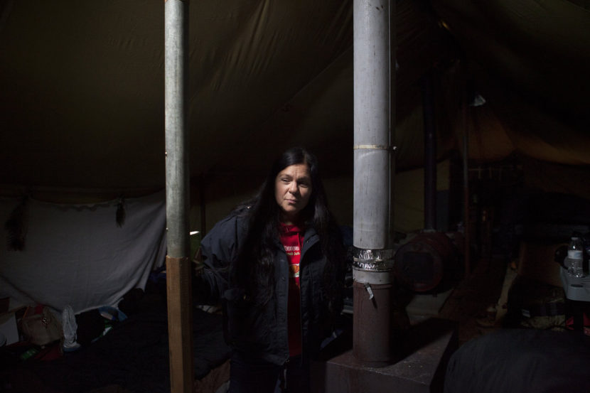 Kareen Lewis, a member of the Little River Band of Ottawa tribe, has bounced back and forth for months between home, in Hart, Michigan, and the Oceti Sakowin camp. Celia Talbot Tobin for NPR