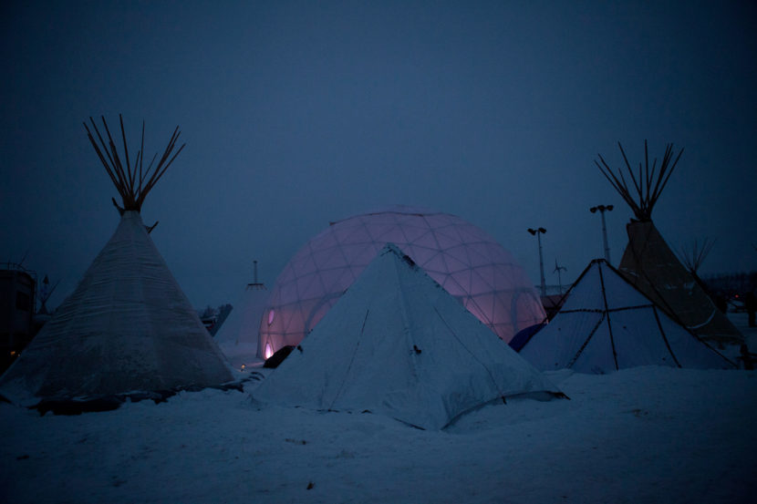 A geodesic dome, which was donated in October, now serves as a community gathering space. It is one of many structures that have been erected in the camp to prepare for the long winter ahead. Celia Talbot Tobin for NPR