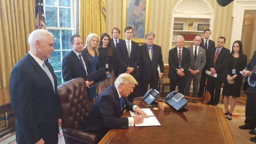 President Donald Trump signs legislation expediting two controversial energy projects. (Photo by The White House)