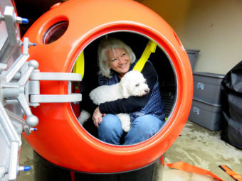 Jeanne Johnson of Ocean Park, Washington, is the first U.S. buyer of a tsunami pod sold by Mukilteo, Washington-based Survival Capsule LLC. (Photo by Tom Banse/Northwest News Network)