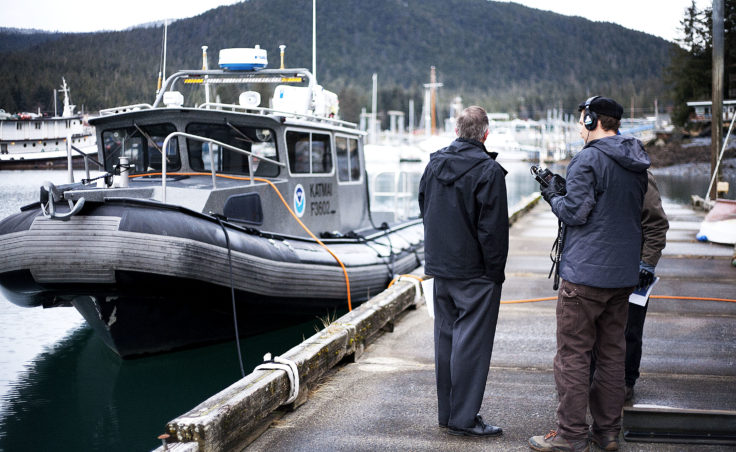 Juneau Docks and Harbors port director Carl Uchytil answers questions for KTOO reporter Jacob Resneck during a tour of the Auke Bay Marine Station property with port engineer Gary Gillette on Tuesday, Jan. 31, 2017. The city would like to expand Statter Harbor and begin utilizing the Auke Bay Marine Station property. (Photo by Tripp J Crouse/KTOO)