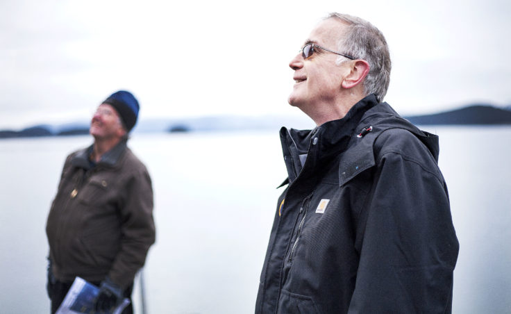 Juneau Docks and Harbors port engineer Gary Gillette and port director Carl Uchytil look at the Auke Bay Marine Station property on Tuesday, Jan. 31, 2017, during a tour of the property. (Photo by Tripp J Crouse/KTOO)