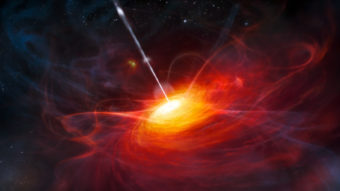 An artist's rendering of a black hole that's 2 billion times more massive than our sun. Streams of particles ejected from black holes like this one are thought to be the brightest objects in the universe. ESO/M. Kornmesser