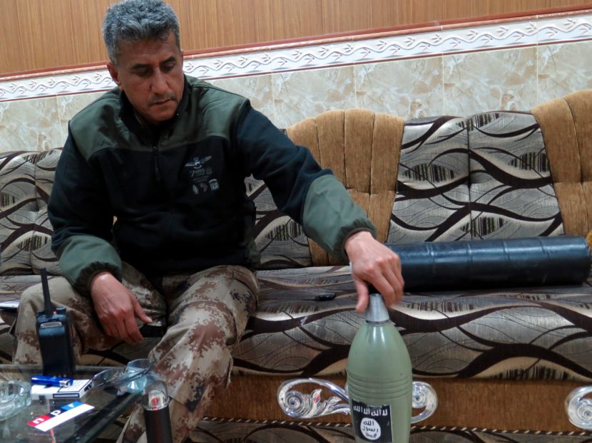 Iraqi Gen. Abdul-Wahab al-Saadi with a locally made mortar. It's almost indistinguishable from Iraqi army mortars apart from the black and white ISIS logo painted on it.