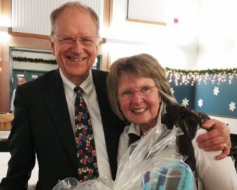 Retiring Dr. David Johnson and his wife, Jenny, are seen at the PeaceHealth Ketchikan holiday party. (Photo by PeaceHealth)