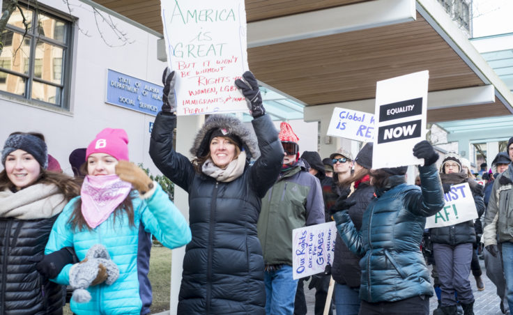 Protesters walk down Main Street during the Women's March on Juneau. (Photo by Annie Bartholomew/KTOO)