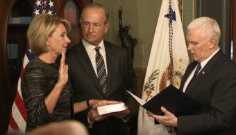 Betsy DeVos is sworn in by Vice President Mike Pence as the Secretary of Education. (Screenshot from White House video)