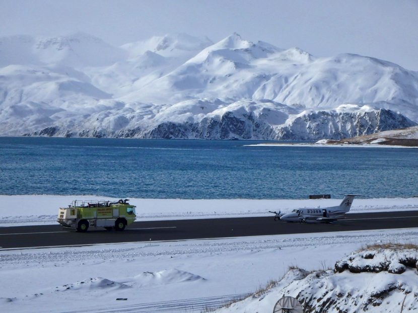 Responders arrive on the runway after a Grant Aviation plane touches down without landing gear Tuesday afternoon. Photo courtesy of Aleutian Islands Photography)