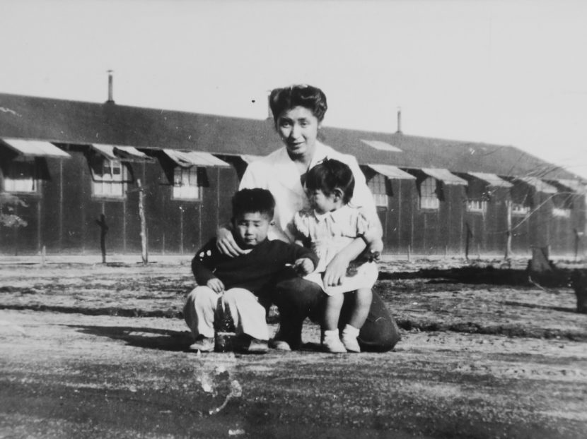 This 1945 photo provided by the family shows Shizuko Ina, with her son Kiyoshi (left) and daughter Satsuki in an internment camp in Tule Lake, Calif. This photograph was taken by a family friend who was a soldier at the time, since cameras were considered contraband at the camp. Satsuki was born at the camp. Courtesy of the Ina family/AP