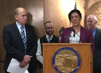 Gov. Bill Walker, state Emergency Programs Section Chief Andy Jones, Kara Nelson and state Chief Medical Officer Dr. Jay Butler during the Feb. 16 announcement of Walker's order on opioid addiction. (Photo by Andrew Kitchenman/Alaska Public Media/KTOO)
