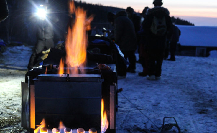 Dallas Seavey’s high-tech new sled includes a mounted, rectangular cook stove, which he says has more surface area to heat water in a shorter amount of time. (Photo by Zachariah Hughes/Alaska Public Media) Iditarod
