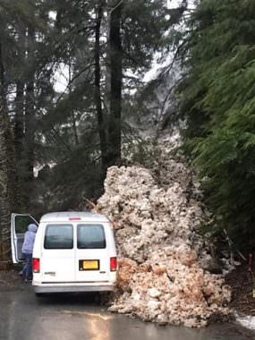 A Mount Juneau avalanche Friday morning came down above the capital city's highlands area It hit a gate and this van, but no one was injured. (Photo courtesy Chief Chad Cameron/Capital City Fire Rescue)