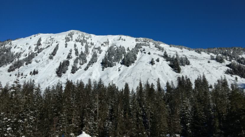 An avalanche down this ridge outside the Eaglecrest Ski Area boundary facing the parking lot caught one skier on Saturday, March 4, 2017. The skier was injured. (Photo courtesy Mikko Wilson)