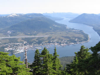 The Alaska Mental Health Trust owns land on the hillside south of Petersburg, near the top right of this photo. (KFSK file photo)