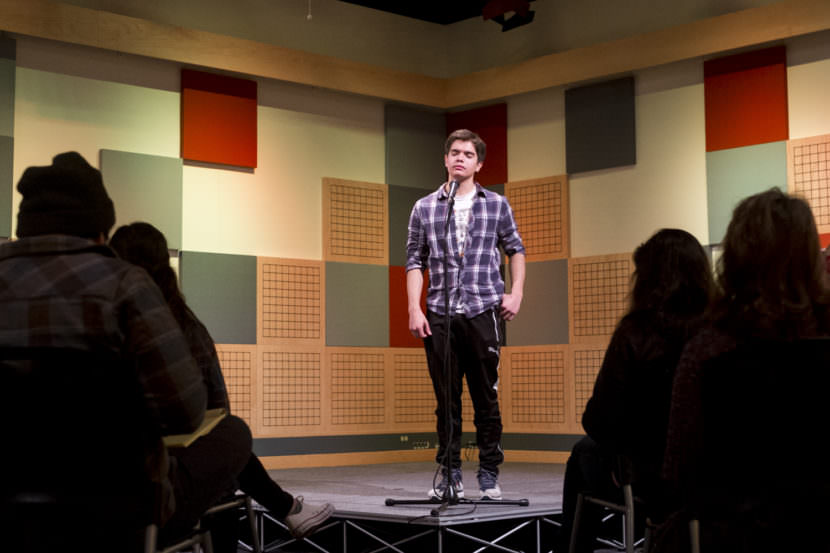 Homer High School student Juan Sarmiento performs "every single day" by John Straley during rehearsal for the Alaska state Poetry Out Loud finals in Juneau. (Photo by Annie Bartholomew/KTOO)