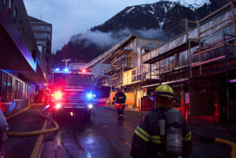Firefighters and emergency personnel work the scene of a possible fire Saturday night, April 15, 2017, in the 200 block of Seward Street, downtown Juneau. (Photo courtesy Tripp J Crouse)