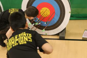 Bethel Schools Archery team earned first place in the state in both the elementary and middle school divisions. Students now have their sights set on the national competition in Louisville, Kentucky this May. (Photo by Dean Swope/KYUK)