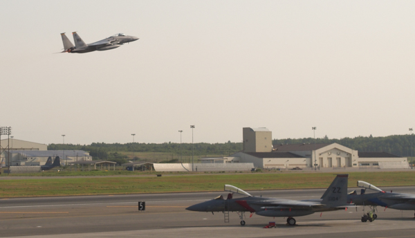 F-22 fighter jets taking off from JBER in June 2015 morning as part of the Northern Edge exercise. (File photo by Zachariah Hughes, Alaska Public Media)