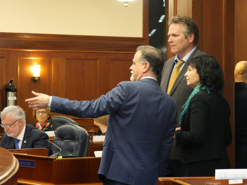 Majority Leader Peter Micciche, R- Soldotna, Sen. Mike Dunleavy, R-Wasilla, and Sen. Shelley Hughes, R-Palmer, (left to right) talk during an at-ease on the Senate Floor, April 6, 2017. (Photo by Skip Gray/360 North)