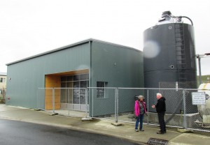 The Ketchikan International Airport’s new biomass boiler building is seen last summer. The pellet silo on the right holds up to 30 tons.