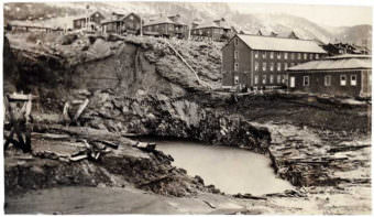 In this photo taken April 22, 1917, shows a massive sinkhole that opened up as the Treadwell Mines collapsed and filled with seawater.