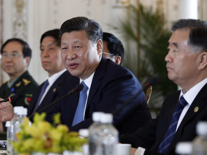 Chinese President Xi Jinping speaks during a meeting with President Trump at Mar-a-Lago resort in Florida on Friday. The U.S. missile strike in Syria added weight to Trump's suggestion he might act unilaterally against the nuclear weapons program of China's neighbor North Korea.
