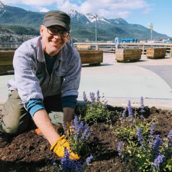 “This is the part I like. I like planting stuff, tending the flowers, the field work, being outside in all weather,” said Ben Patterson, CBJ Landscape Maintenance Supervisor who also manages a 10-person seasonal crew. “You can look back at the end of the day, see what’s been planted and you can see people enjoying it. It’s a little more rewarding than the office half of the job. The greenhouse is also really fun. We do about 16,000 annuals every year that grow from seed that we put all around town in 33 different spots.”