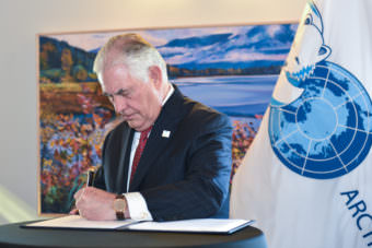 U.S. Secretary of State Rex Tillerson signs the Fairbanks Declaration during the 10th Ministerial Meeting of the Arctic Council in Fairbanks on May 11, 2017.