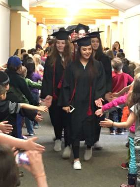 Juneau-Douglas seniors walk through Harborview Elementary School on Friday.