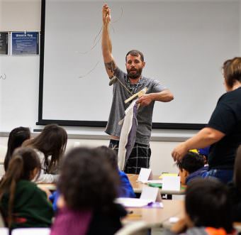 James White shows traditional fishing techniques during a aath and culture academy in July 2016. (Photo by Nobu Koch/Sealaska Heritage Institute)