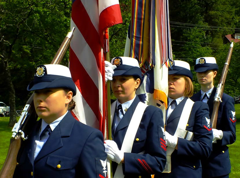 The U.S. Coast Guard color guard waits for the start of the Memorial Day 2017 observance at Evergreen Cemetery.