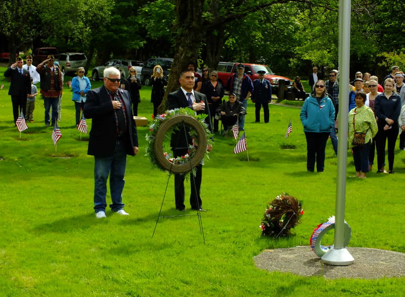 Wreaths are laid during a 2017 Memorial Day observance at Evergreen Cemetery. (Photo by Matt Miller/KTOO)