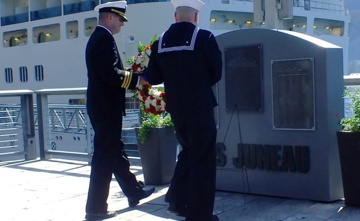 Representatives of the officers and crew from USS O’Kane place a wreath at the memorial for USS Juneau on the downtown waterfront on Tuesday, May 16, 2017.
