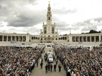 Hundreds of thousands of pilgrims gathered in Fatima, Portugal Saturday, where Pope Francis canonized two new saints. Jacinta and Francisco Marto were children 100 years ago when their visions of the Virgin Mary marked this place as an important Catholic shrine.