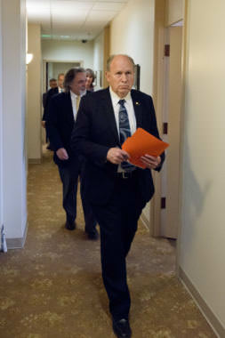 Gov. Bill Walker walks to a meeting with House minority caucus members on June 5, 2017. Walker proposed a compromise that includes a head tax. (Photo courtesy Alaska Governor's Office)